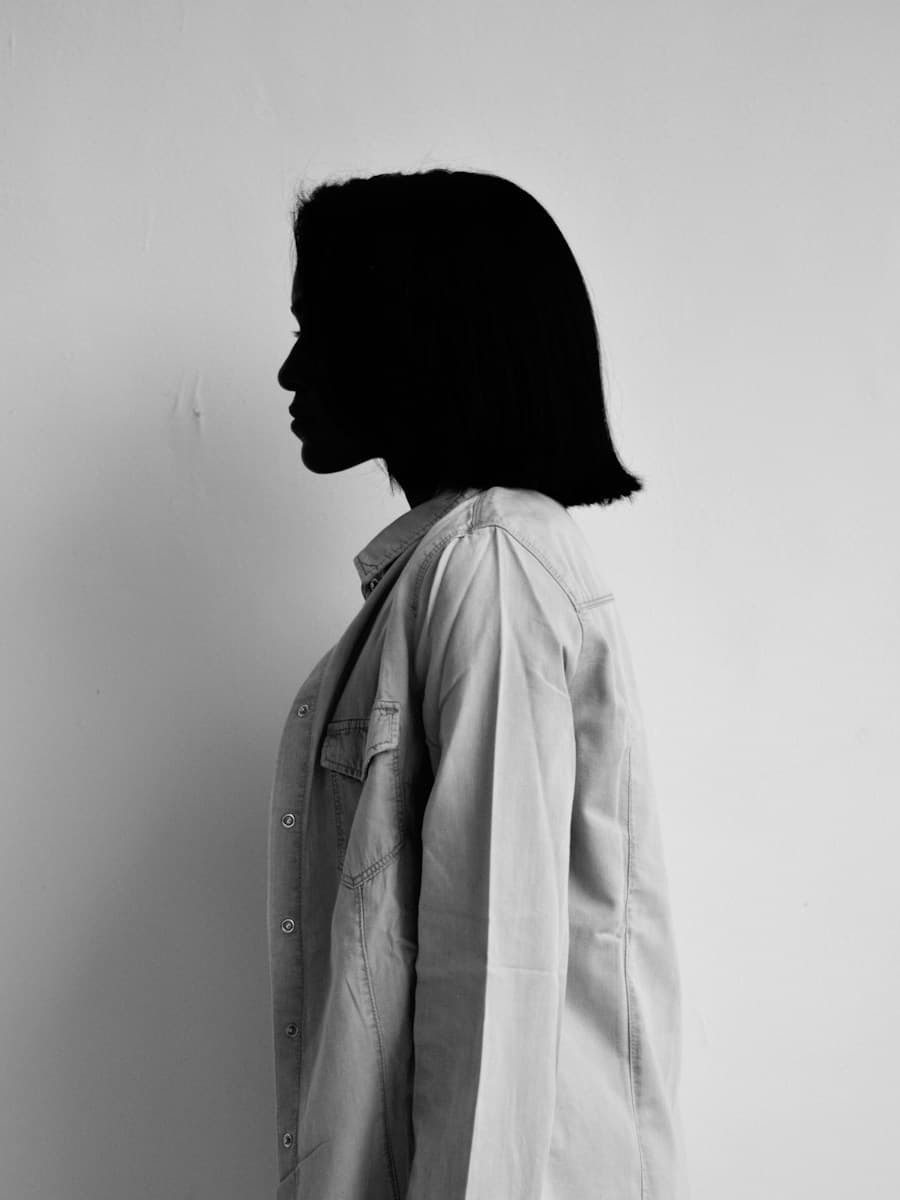 Editorial side profile portrait of Dr. Lena Moreau